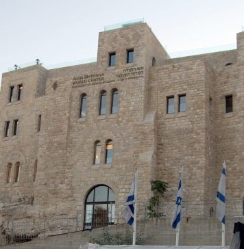 is aish a cult - the aish hatorah building in front of the western wall in jerusalem, founded by rabbi Noah Weinberg